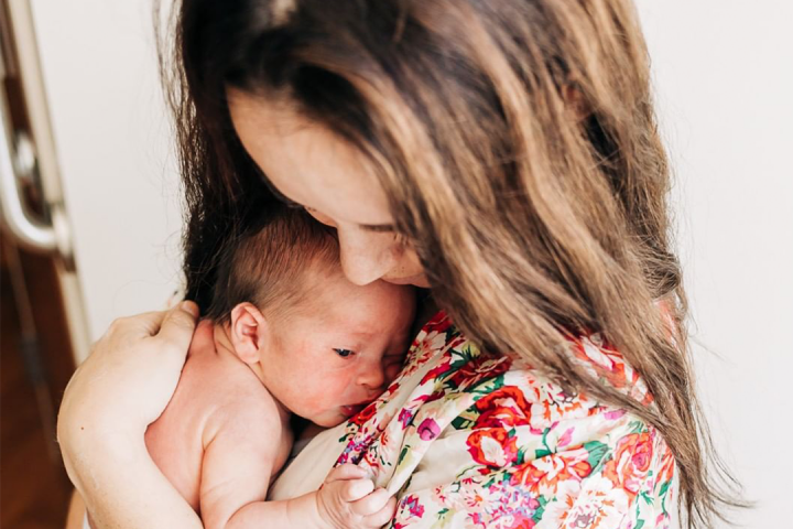 first-time mom with newborn baby