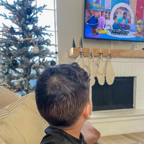 kid watching show on tv