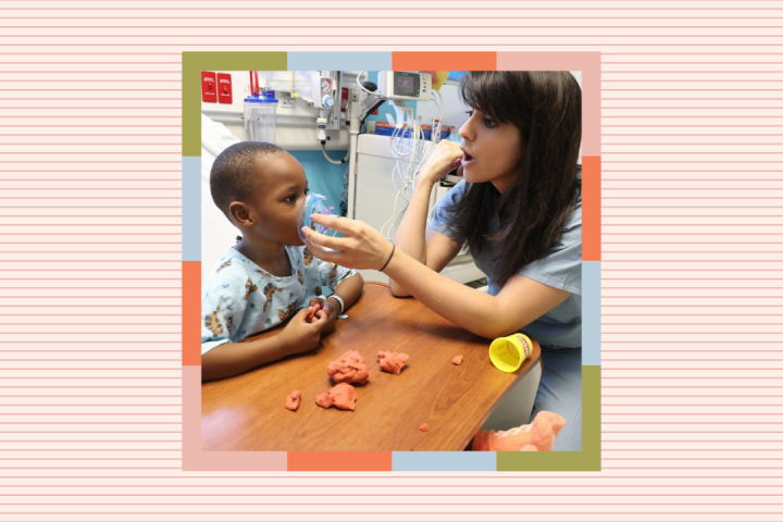 child interacting with child life specialist