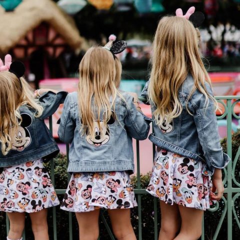 three girls in disney denim jackets