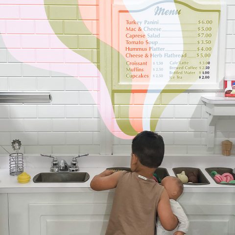 child playing using their imagination