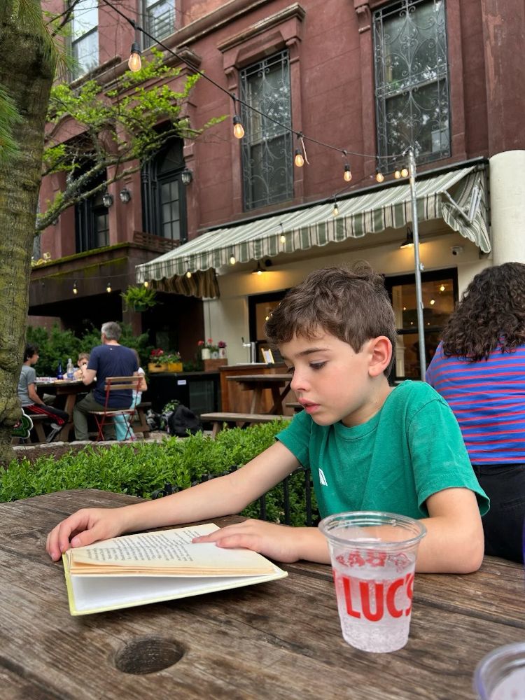 kid reading chapter book