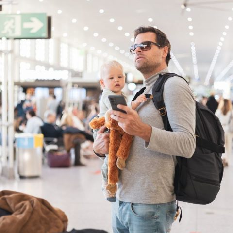 dad flying with baby
