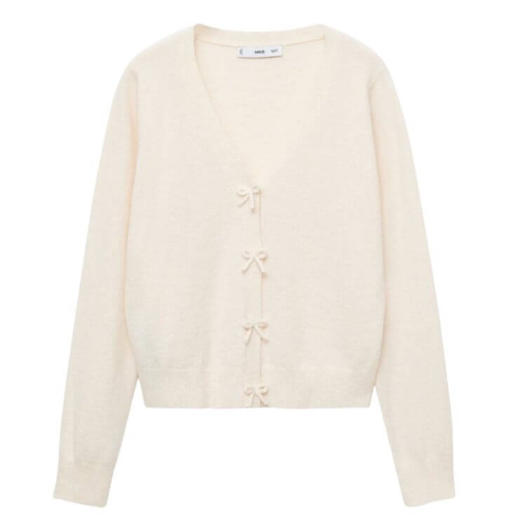 cream sweater with bows for the holidays