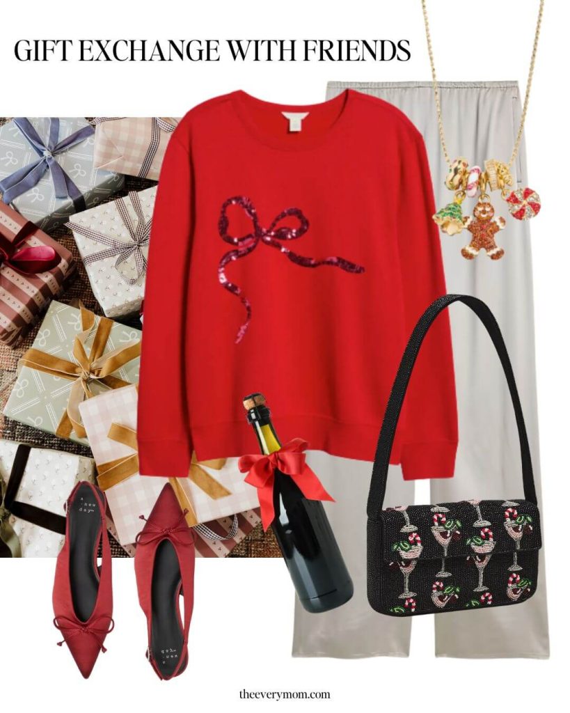 holiday outfit idea with satin pants and red christmas sweater
