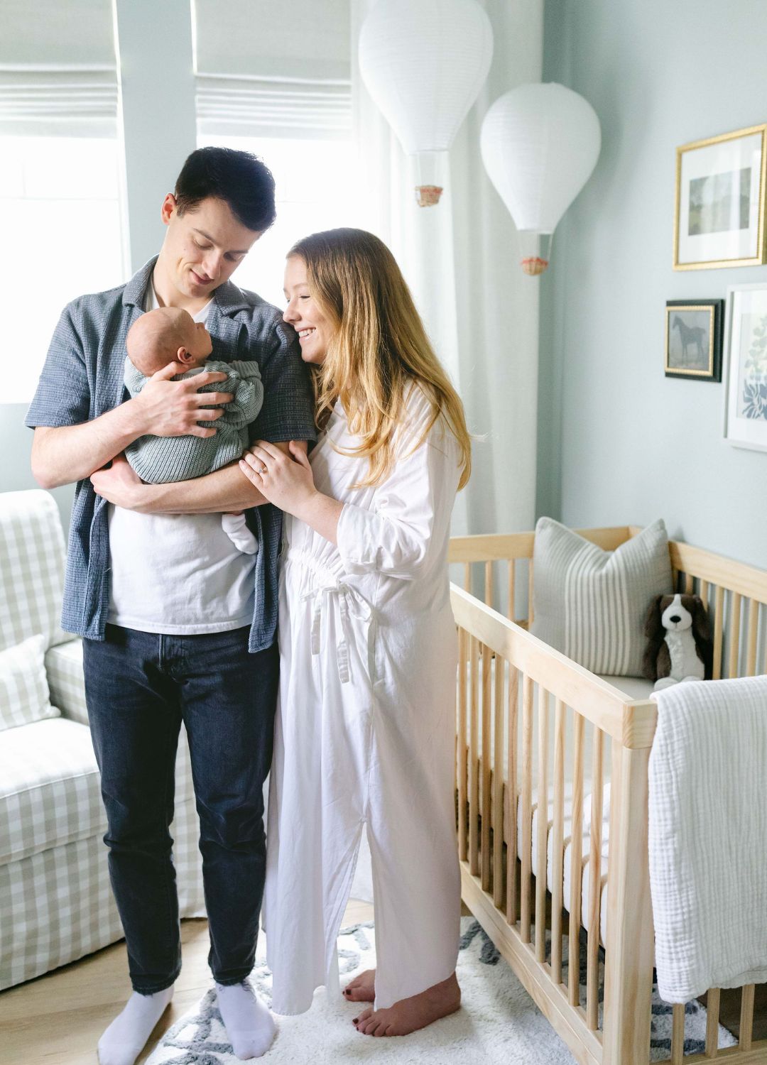 family in vintage boy nursery