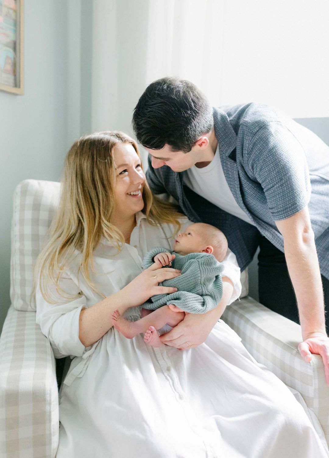 family in vintage boy nursery