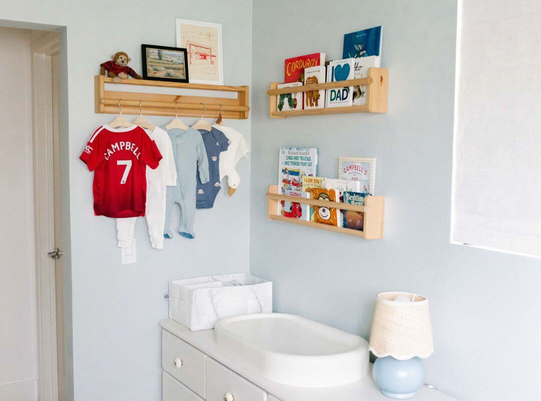 vintage boy nursery shelf styling