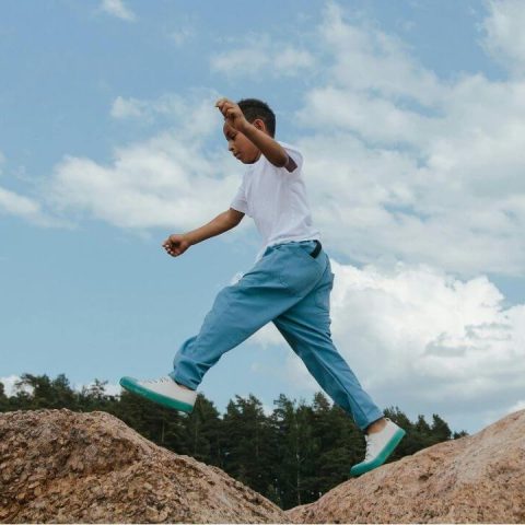 fafo parenting kid jumping on rock