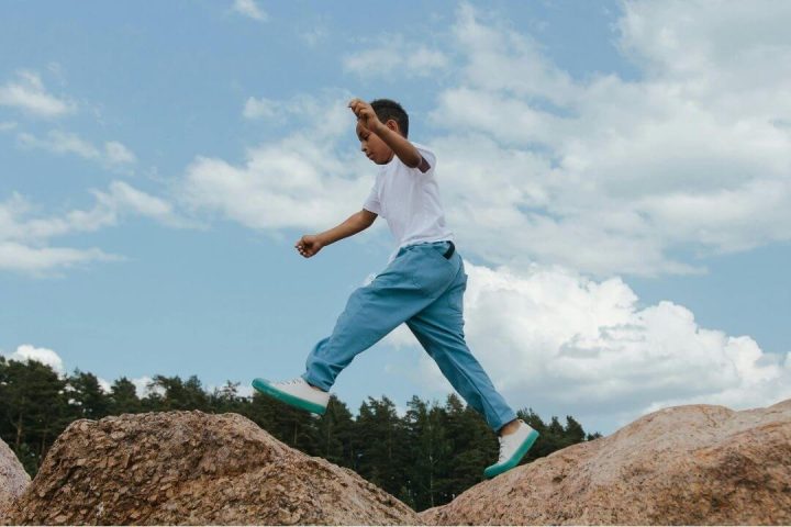 fafo parenting kid jumping on rock