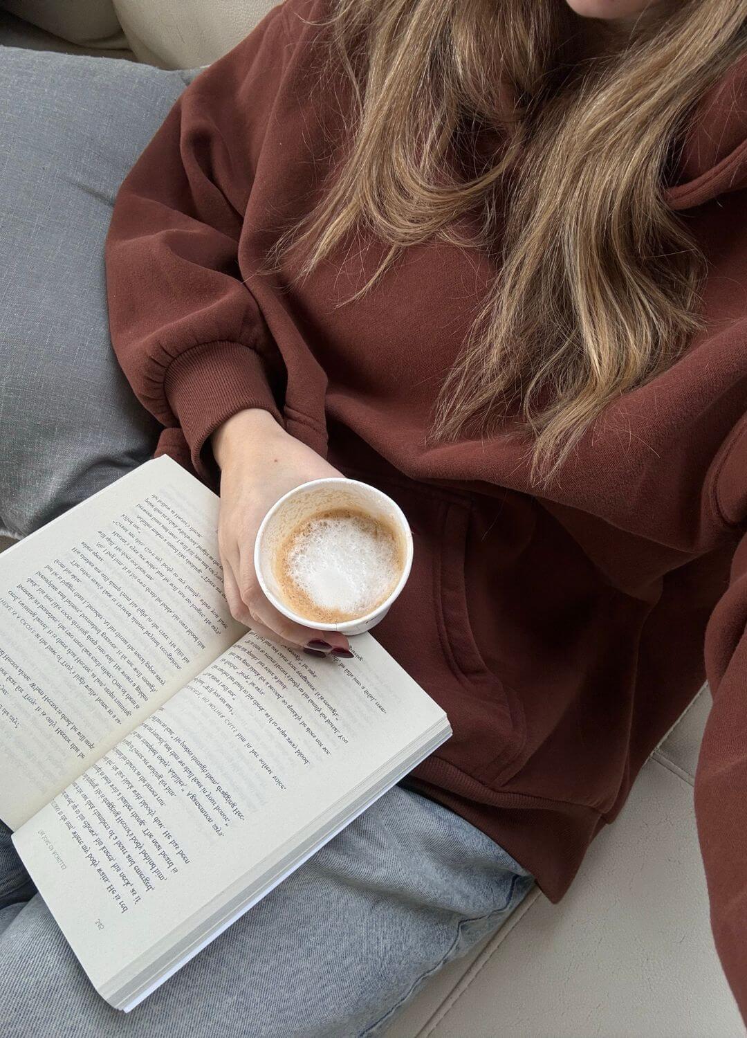 woman reading Elin Hilderbrand The Academy