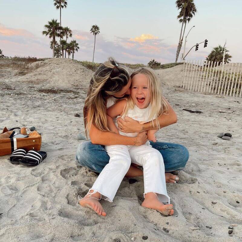 mom and daughter at beach
