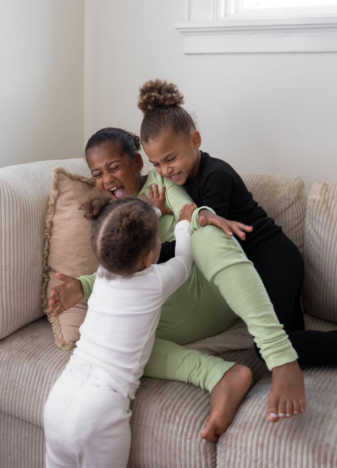 kids playing on couch