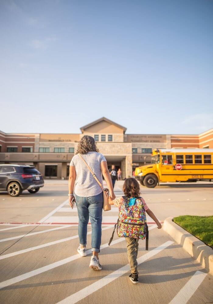 parent in kid walking into school