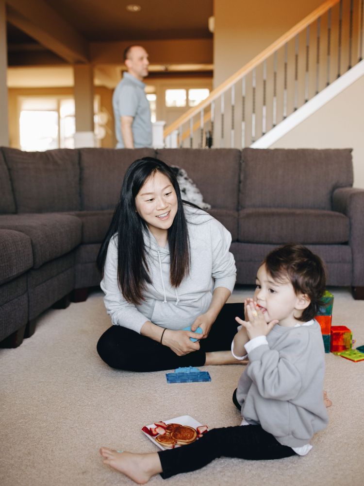 pregnant mom playing with daughter