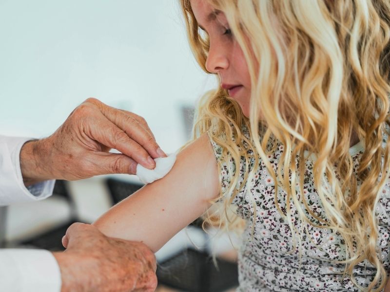 child getting vaccine