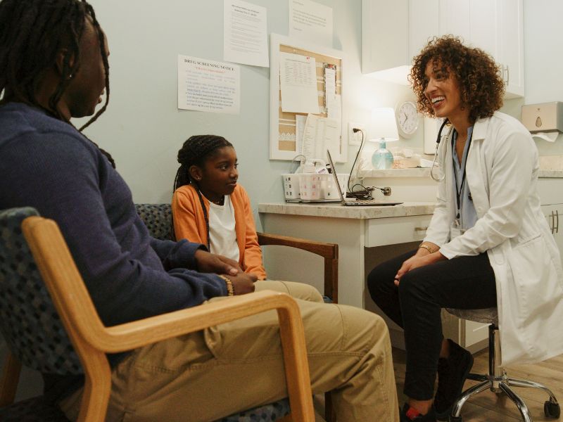 parent and kid at doctor's appointment