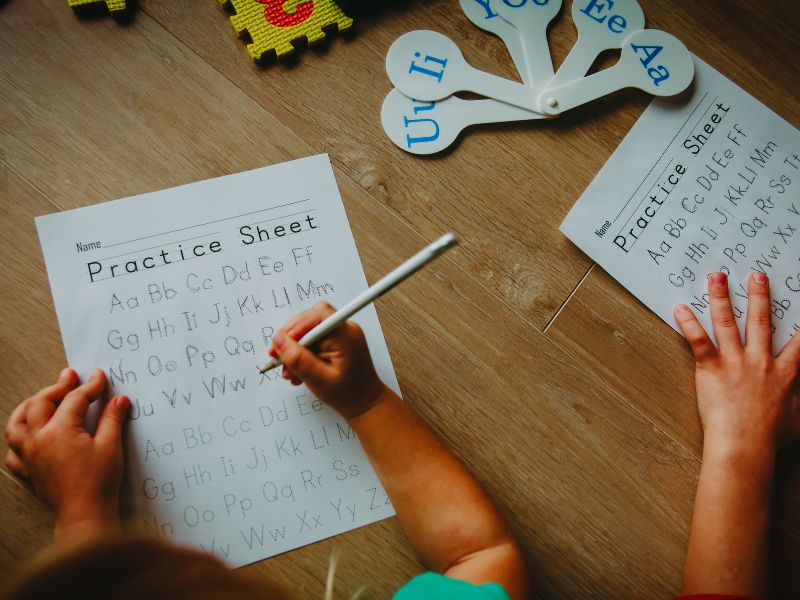 kids writing on worksheets