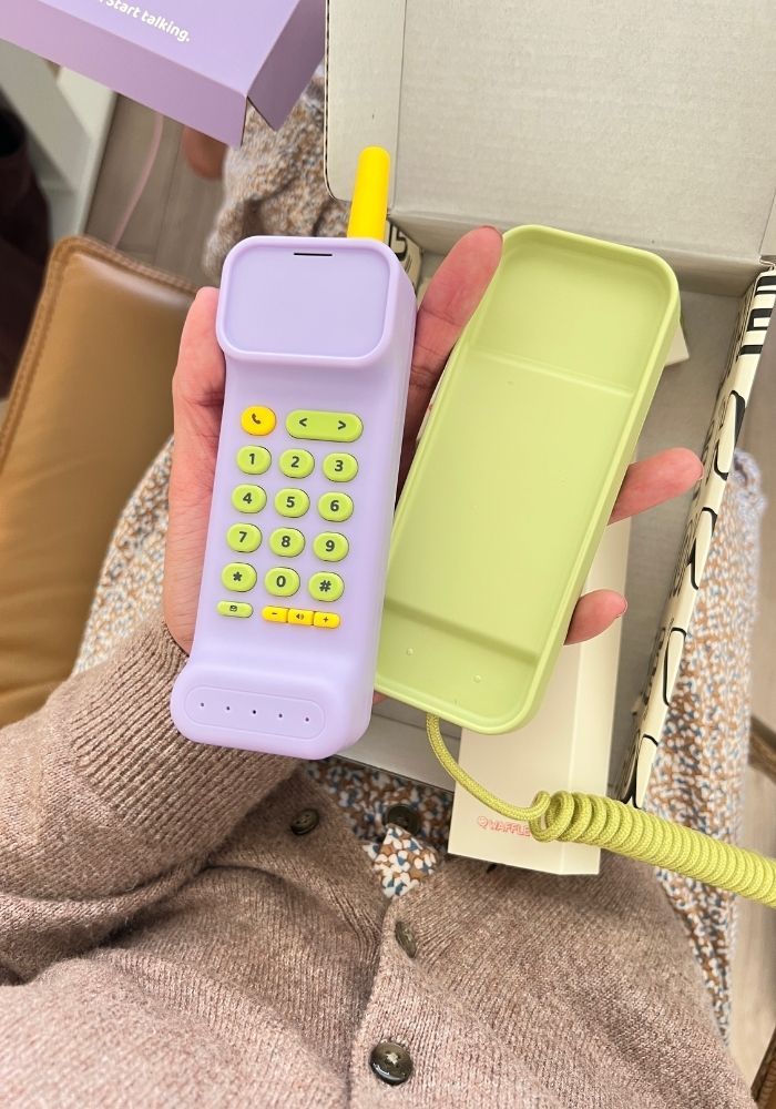 holding waffle home phone